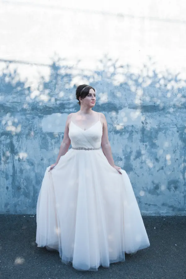 Bride in wedding dress at outdoor Seattle-area wedding. Lovely Events.